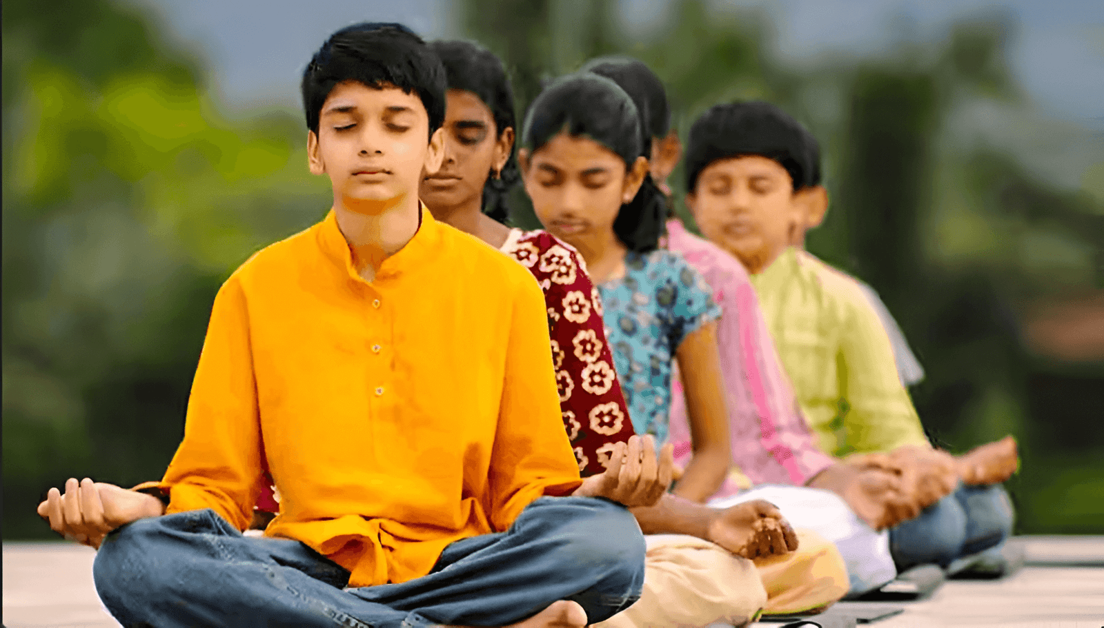 Children Meditating In Row